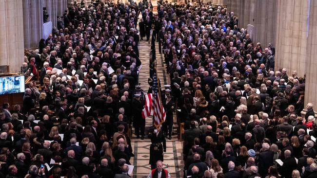 Jimmy Carter’s casket is carried out of the National Cathedral in Washington. Picture: AFP