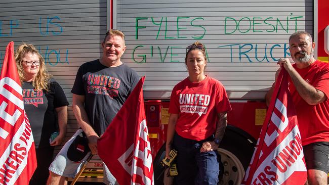 United Workers Union NT secretary Erina Early, left, Darwin leading firefighter Peter Jelly, Marrara senior firefighter Keeley Stewart, and Darwin station officer David Lines protesting the NT Government's pay offer. Picture: Pema Tamang Pakhrin