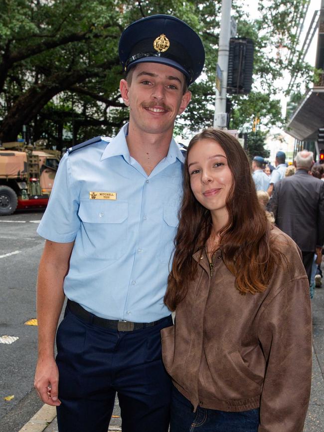Thousands of people have braved the rain to gather in Brisbane for Anzac Day services. Picture: Grace Kessels