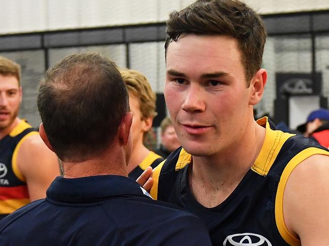 ADELAIDE, AUSTRALIA - JULY 21: Mitch McGovern of the Crows is congratulated by Adelaide Crows Senior Coach Don Pyke after the round 18 AFL match between the Adelaide Crows and the Geelong Cats at Adelaide Oval on July 21, 2017 in Adelaide, Australia.  (Photo by Daniel Kalisz/Getty Images)