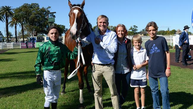 Caserta celebrating Far Too Easy's first win with trainer David McColm. Picture: Grant Peters/Trackside Photography