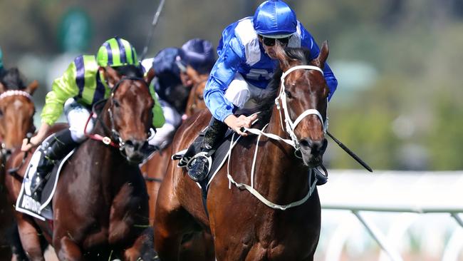 Winx and jockey Hugh Bowman go for home. Picture: Alex Coppel