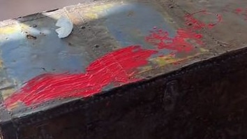 A coffee table also fell victim to the red paint. Picture: Instagram/@indyclinton