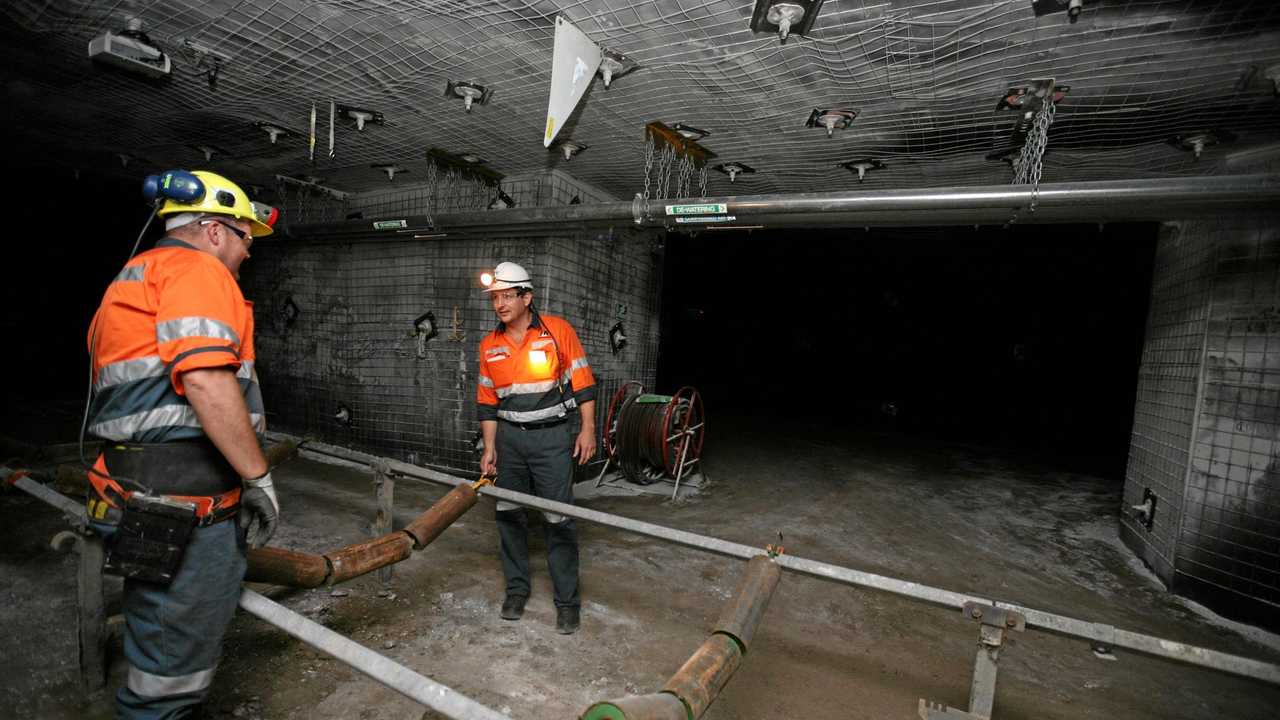 Mastermyne trainee Graeme Willett with managing director Tony Caruso in the underground mine simulator created in Mackay for training purposes.