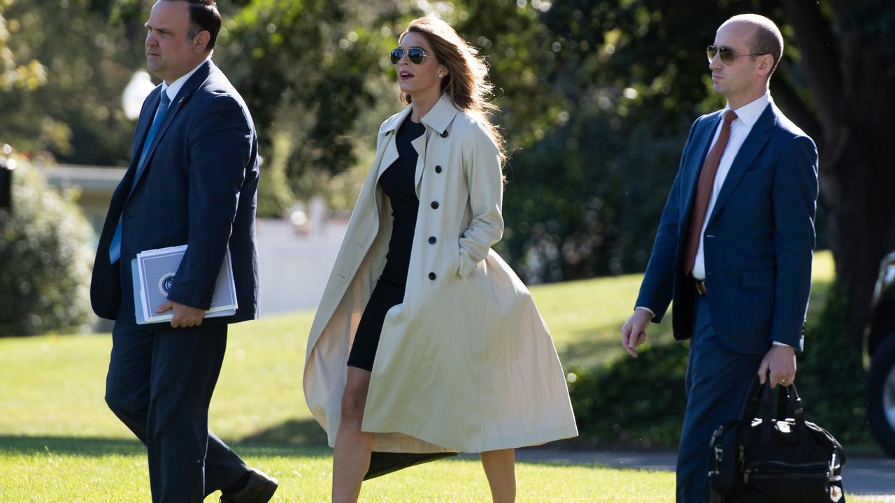 Here we see Ms Hicks with fellow Trump staffers Dan Scavino and Stephen Miller, on their way to board Marine One on September 21. Picture: Saul Loeb/AFP