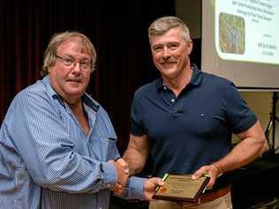 WINNERS: Bundaberg Canegrowers chairman Allan Dingle and District Champion Wayne Baldry. Picture: PAUL BEUTEL