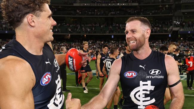 Charlie Curnow congratulates Docherty on his incredible comeback. Picture: Michael Klein