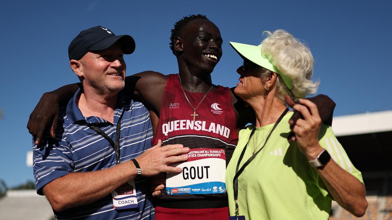 Gout celebrating with manager James Templeton (left) and coach Di Sheppard. (Photo by Cameron Spencer/Getty Images)