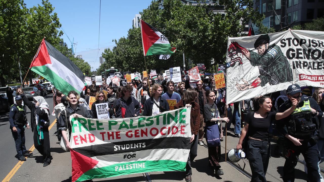 A student protest calling for Israel to end the war in Palestine held at the American Consulate in Melbourne marches down St Kilda Road. Picture: NCA NewsWire / David Crosling