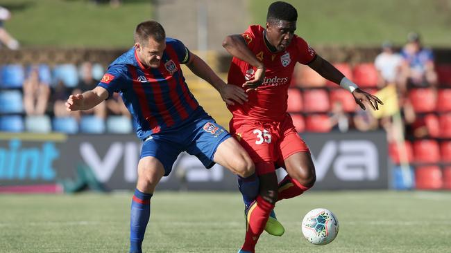 Teenage striker Al Hassan Toure will miss Adelaide United’s meeting with Central Coast due to international duty. Picture: Ashley Feder/Getty Images