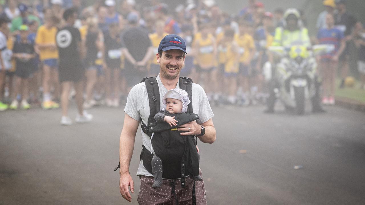 Nick and Bobbi Talbot get ahead of the start to watch other family members in the Peak2Park 4km event, Sunday, March 3, 2024. Picture: Kevin Farmer