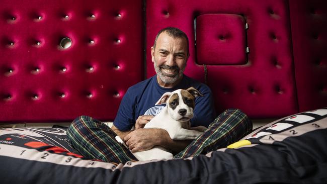 Mac at home with his pup George Michael in 2019. Picture: Hollie Adams