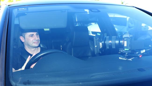 Anthony Koletti pictured arriving and leaving the Dover Heights residence he once shared with Melissa Caddick. Picture: Matrix