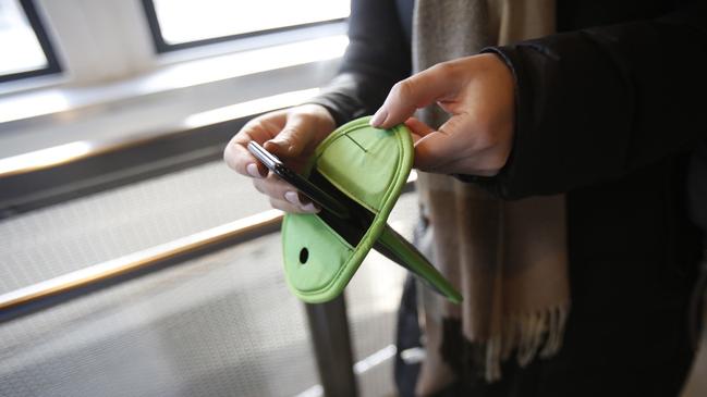 The Yondr system being used by Gympie State High School and James Nash State High School in 2023 requires students to lock their mobile phones inside a pouch. The pouch can be unlocked as they leave the grounds at the end of the day.