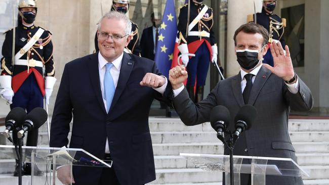 Mr Morrison holds a joint media conference with French President Emmanuel Macron after a working dinner at the Presidential Palace in France. Picture: Adam Taylor/PMO