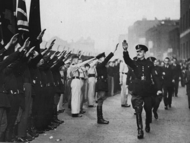 Fascist leader Oswald Mosley inspecting members of the British Union of Fascists outside the Royal Mint in London in 1935.