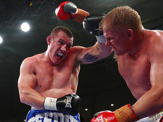 Paul Gallen and Ben Hannant exchange punches. Picture: Chris Hyde/Getty