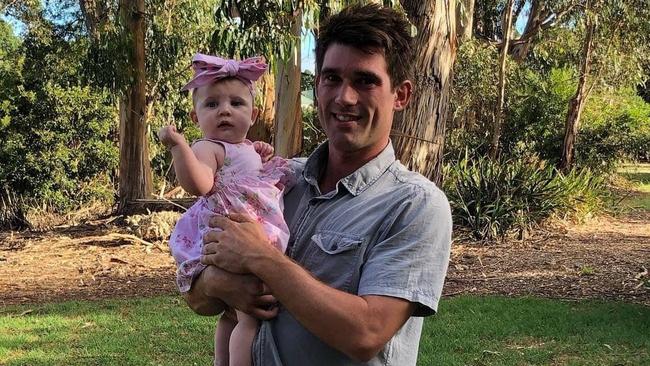 Jarrod Davies, 27, who was found dead in the River Derwent at Hobart, pictured with his niece. Picture: SUPPLIED