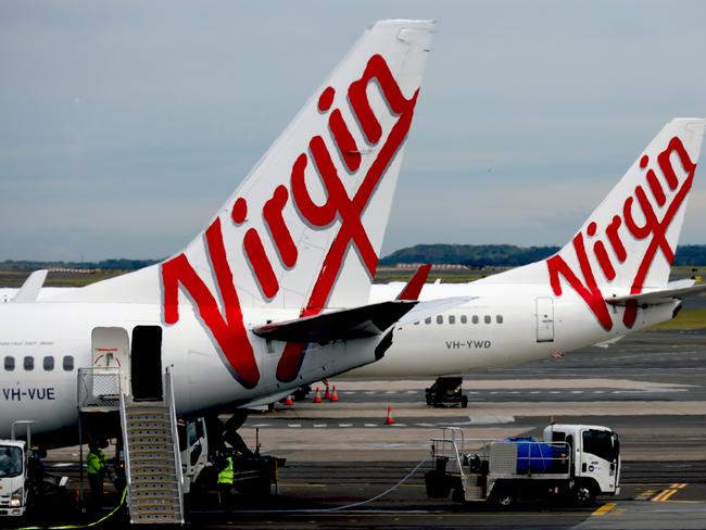 SYDNEY, AUSTRALIA - NewsWire Photos - SEPTEMBER 09, 2022: General generic editorial stock image of Virgin airplane at Sydney Domestic Airport. Picture: NCA NewsWire / Nicholas Eagar