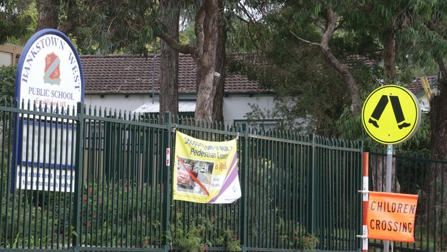 The white hydroponic house behind the yellow walk sign was situated right next to Bankstown West Public School.