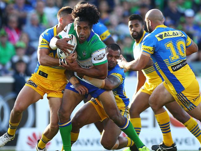CANBERRA, AUSTRALIA - APRIL 01: Iosia Soliola of the Raiders is tackled during the round five NRL match between the Canberra Raiders and the Parramatta Eels at GIO Stadium on April 1, 2017 in Canberra, Australia.  (Photo by Mark Nolan/Getty Images)