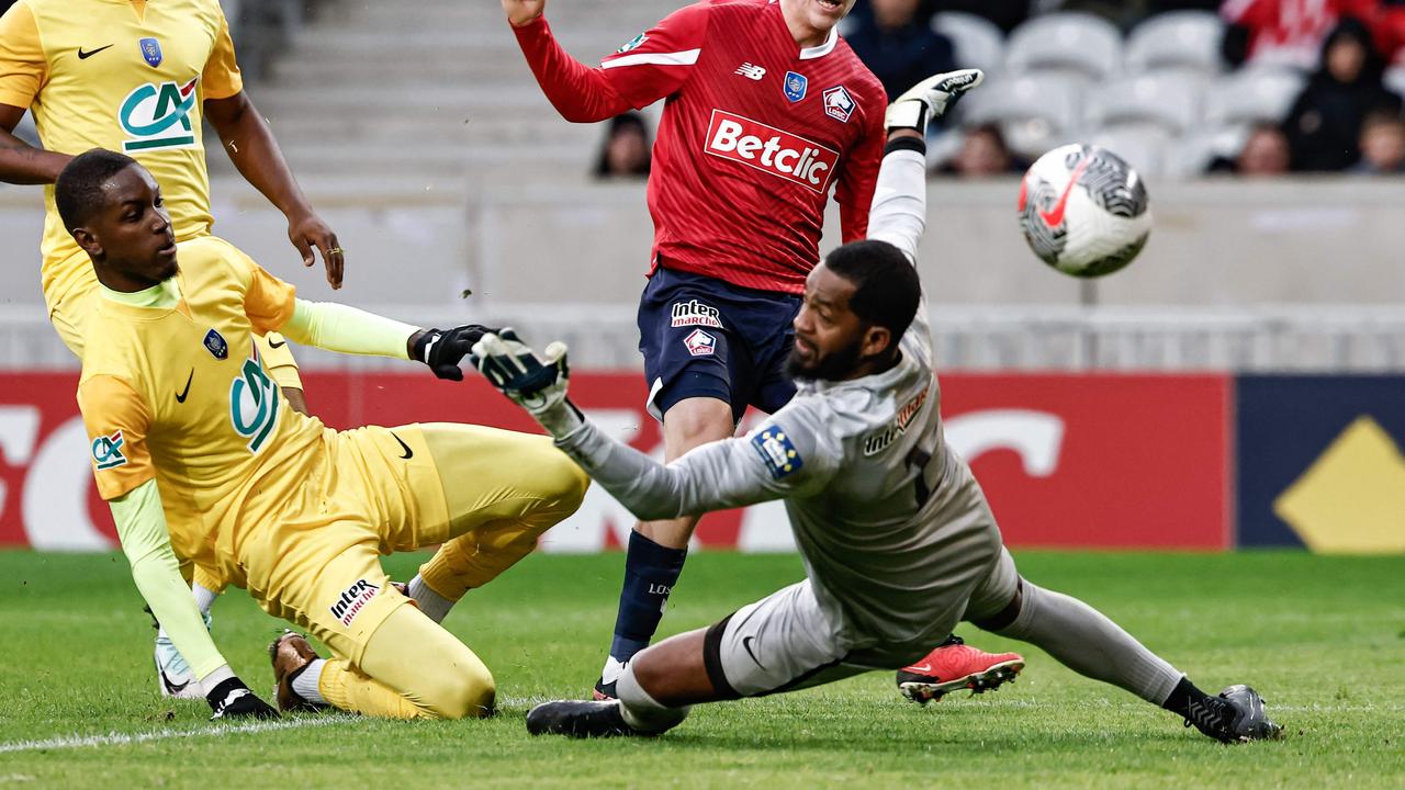 Lille's Icelandic midfielder #07 Hakon Haraldsson (2nd-L) scores an off-side goal during the French Cup football match between Lille LOSC and Golden Lion FC at the Pierre-Mauroy Stadium in Villeneuve-d'Ascq, northern France, on January 6, 2024. (Photo by Sameer Al-DOUMY / AFP)