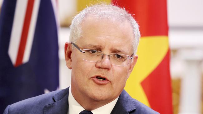 Scott Morrison at a press briefing at the Government Office in Hanoi, Vietnam on Friday. Picture: AP Photo/Duc Thanh, Pool