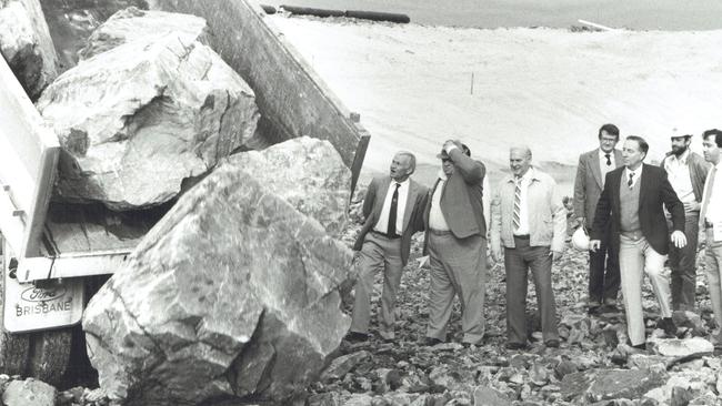 Construction of the rock walls for the new Seaway at Southport bar July, 1984. (L-R) Doug Jennings, Russ Hinze, Bill Lavor, Denis O'Connell and Rob Borbidge. Supplied photo.