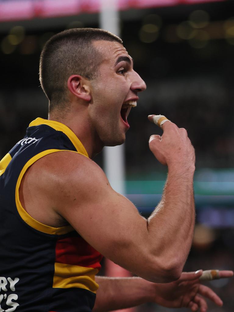 Josh Rachele taunts Port Adelaide fans during the Showdown. Picture: James Elsby/AFL Photos via Getty Images