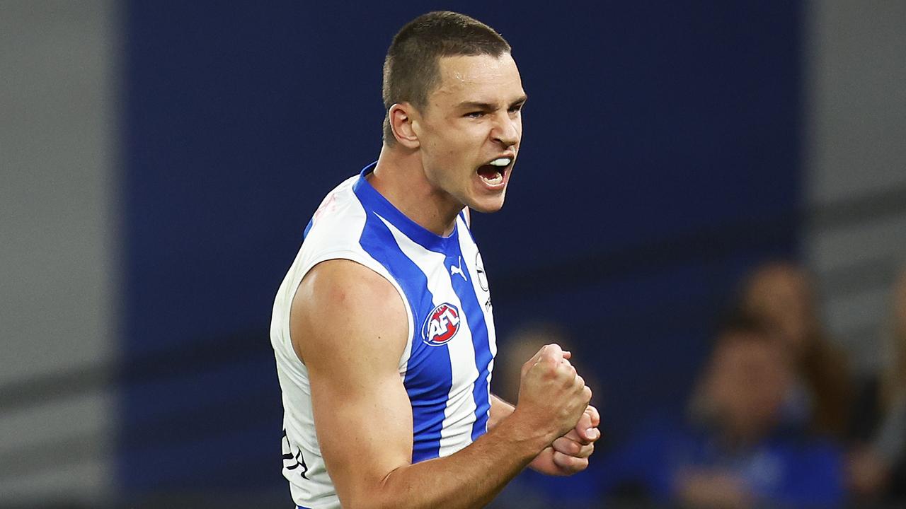 MELBOURNE, AUSTRALIA - AUGUST 20: Luke Davies-Uniacke of the Kangaroos celebrates kicking a goal during the round 23 AFL match between the North Melbourne Kangaroos and the Gold Coast Suns at Marvel Stadium on August 20, 2022 in Melbourne, Australia. (Photo by Daniel Pockett/Getty Images)