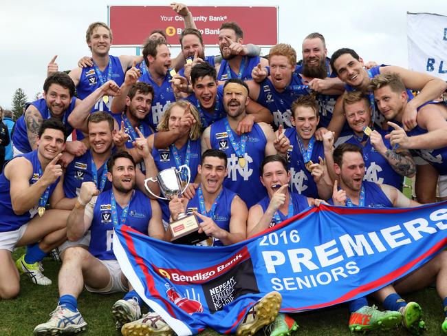 Hastings players celebrate with the premiership cup during the Nepean FL Grand Final between the Frankston Bombers and Hastings played in Frankston on Saturday 10th September, 2016. Picture: Mark Dadswell