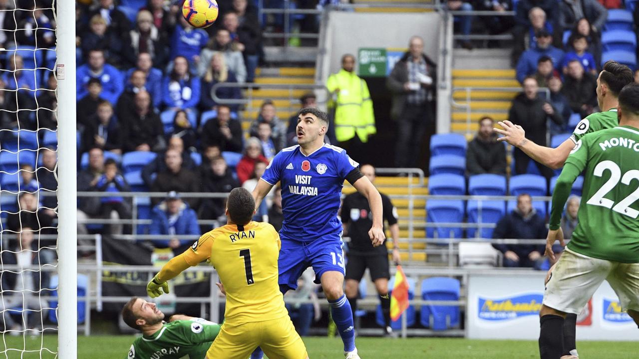 Cardiff City's Callum Paterson (left) has a shot saved by Brighton &amp; Hove Albion goalkeeper Mathew Ryan