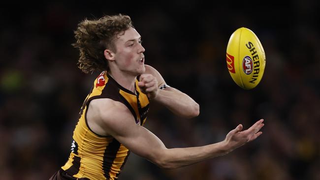 MELBOURNE, AUSTRALIA - JULY 30: Josh Weddle of the Hawks handballs during the round 20 AFL match between Hawthorn Hawks and St Kilda Saints at Marvel Stadium, on July 30, 2023, in Melbourne, Australia. (Photo by Darrian Traynor/Getty Images)