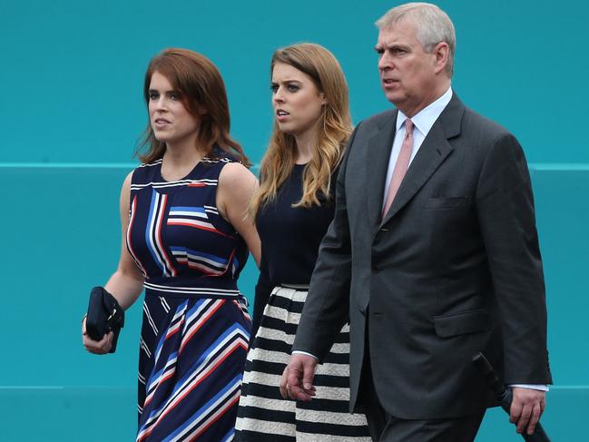 (L-R) Princess Eugenie of York, Princess Beatrice of York and Prince Andrew, Duke of York. Picture: AFP