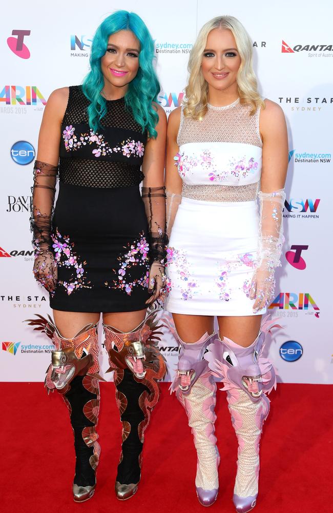 Amy and Emma Sheppard from the band Sheppard wore these matching winged knee length boots at the 2015 event at The Star. Picture: Graham Denholm/Getty Images