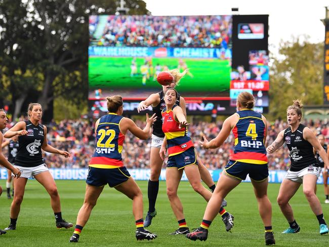 Crows ruck Jess Foley, centre, competes in a contest during March’s AFLW grand final win over Carlton at Adelaide Oval. Picture: Daniel Kalisz/Getty Images