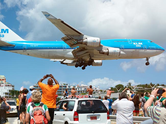 While it’s a great photo opportunity, it can be dangerous to get so close to planes.