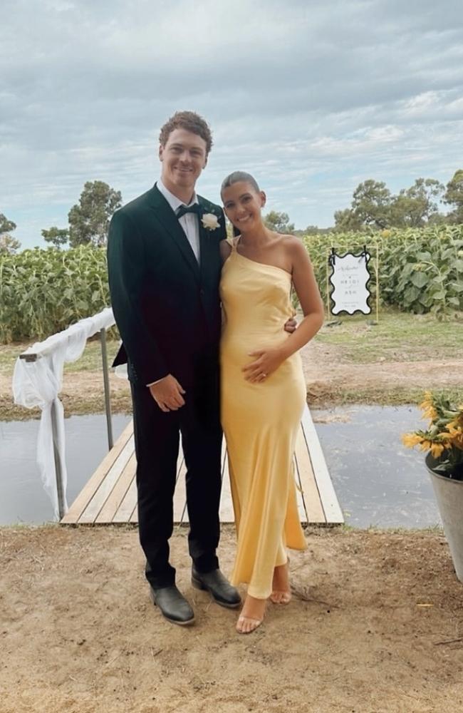 Gary and Madi Rohan revealed their baby news at a friend’s wedding. Picture: Instagram