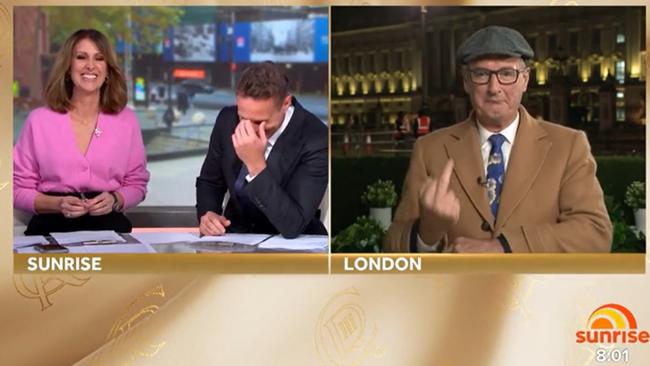 Sunrise host David Koch (right) flipped his co-hosts Natalie Barr and Matt Shirvington the bird after a comment over his flat cap.