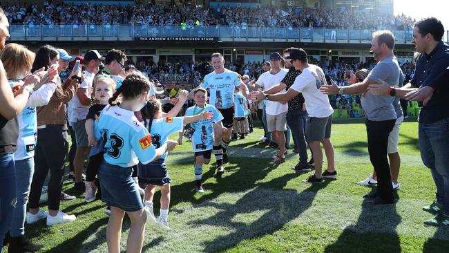 Paul Gallen leads the Sharks out. Picture: Brett Costello