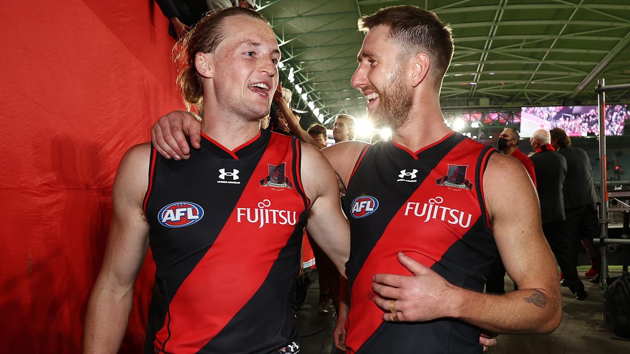 Essendon captain Dyson Heppell (right) is much loved by his teammates. Picture: Michael Klein