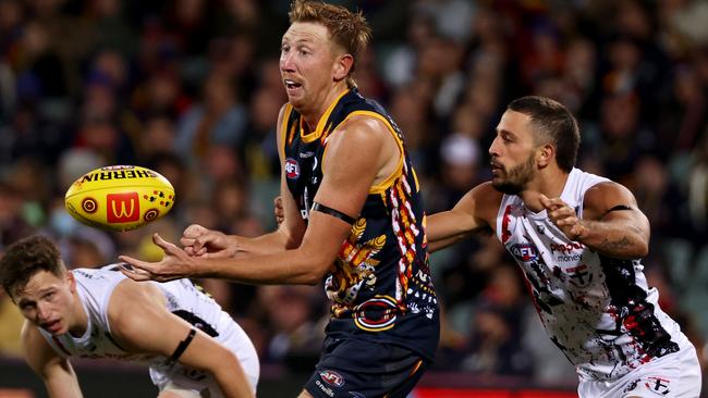 Kieran Strachan says staying at Adelaide is a better option than looking to move clubs despite being trapped behind Reilly O’Brien.