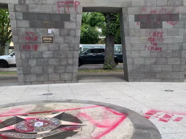 A Victoria Police memorial in Melbourne's Kings Domain gardens has been targeted by vandals. Picture: ABC News, Tania Lee