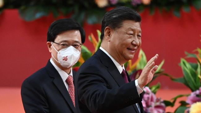 Xi Jinping, right, and John Lee after the Hong Kong Chief Executive was sworn in on Friday. Picture: AFP