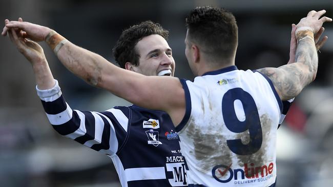 MacedonÃs Zachary Smedley and Jason Cooke during the RDFL football match between Macedon and Romsey in Macedon, Saturday, June 26, 2021. Picture: Andy Brownbill