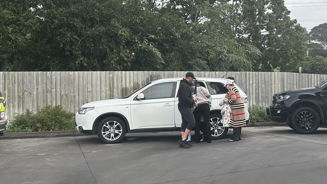 The young children were taken away from the 7-Eleven in a family car about 8:40am.