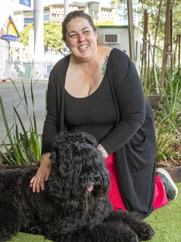 Kim Dawson with Reik the Black Russian Terrier at the Ekka at the RNA Showgrounds in Bowen Hills on Thursday. Picture: Richard Walker