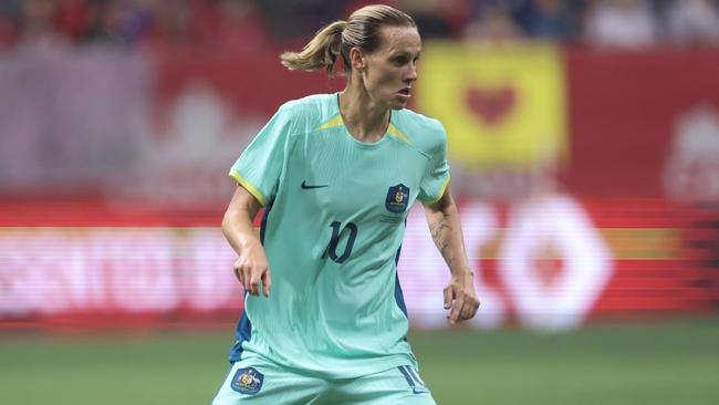 VANCOUVER, BRITISH COLUMBIA - DECEMBER 05: Emily Van Egmond #10 of Australia controls the ball during the first half against Canada at BC Place on December 05, 2023 in Vancouver, British Columbia. (Photo by Craig Mitchelldyer/Getty Images for Football Australia)