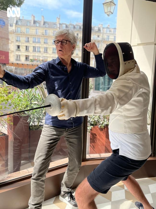 Jules Schiller (R) receives fencing lesson from French fencer, coach and bronze medallist, Patrick Groc. Picture: Instagram / ABC