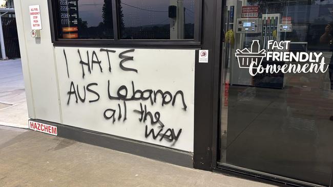 A petrol station in Sydney’s southwest has been forced to close after vandals cut the fuel hoses at the bowser and sprayed racist graffiti on its walls. Picture: Supplied